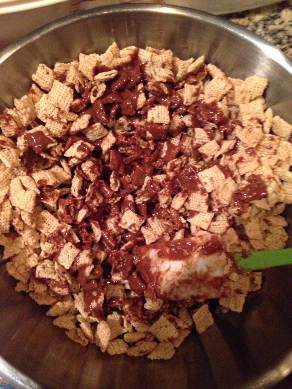 Step 14: Fold in your mixture with the Chex cereal being careful not to break any.