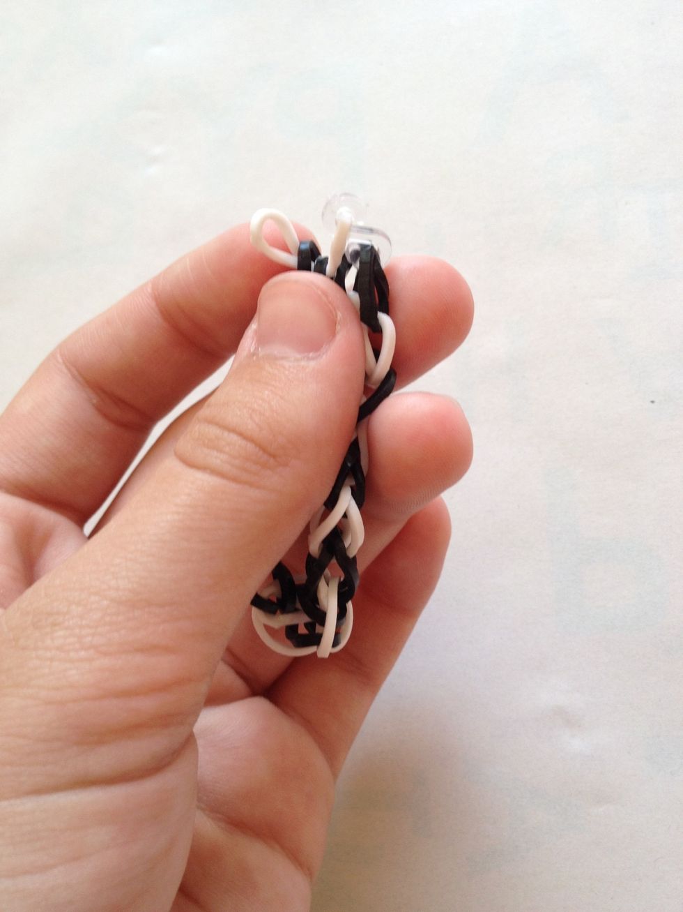 Step 14: now put the band on the hook onto the 's' clip (the white band in my case)