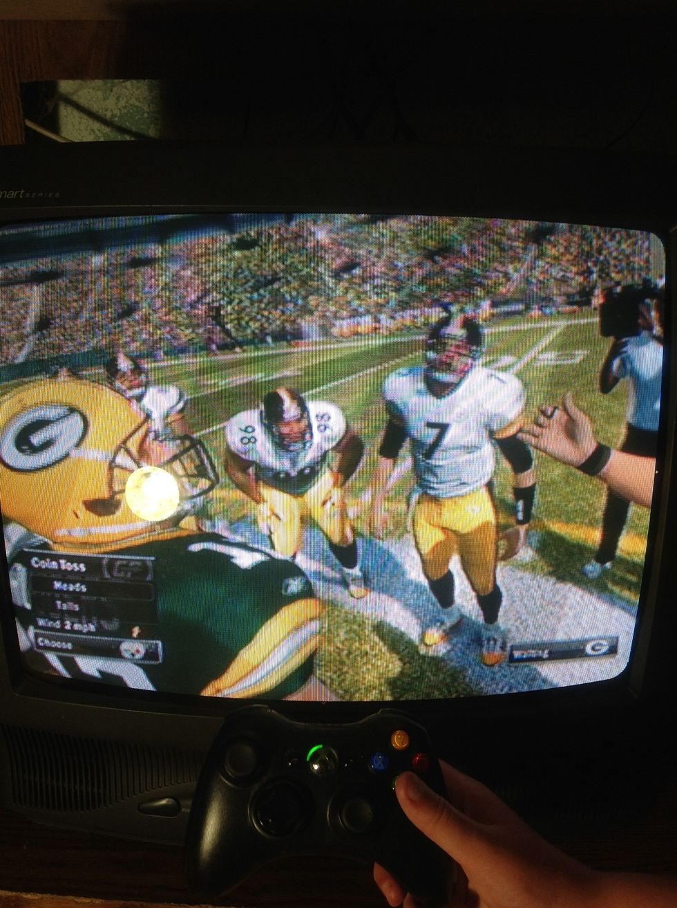 Step 16: Select your option for the coin toss by moving over it and by pressing the A button.