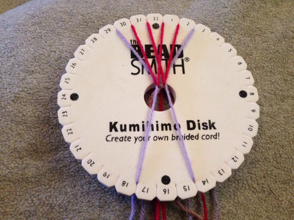 STEP 18 - You should have just 2 threads at the bottom again, and move these one slot to the side again. Thread 16 moves in to slit 17 and thread 15 moves in to slit 14.