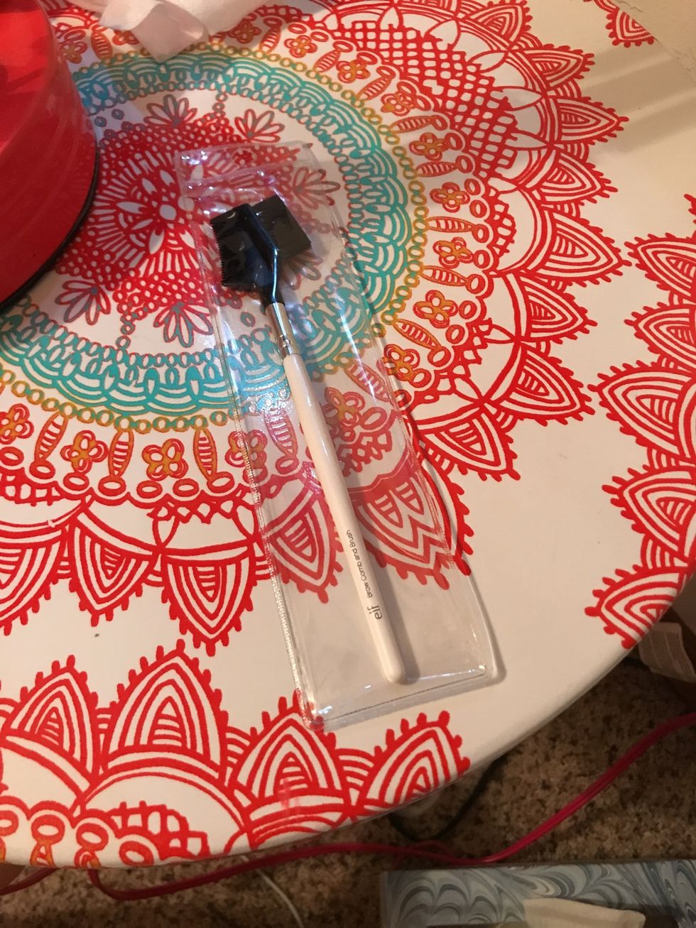 Step 2 Comb eyebrows into a smooth sleek style