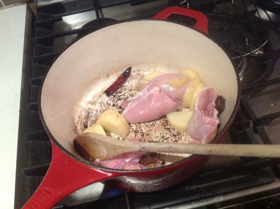 Step 2: increasingly place ingredients i added the chicken and potatoes in to the mix cook until they are browned off