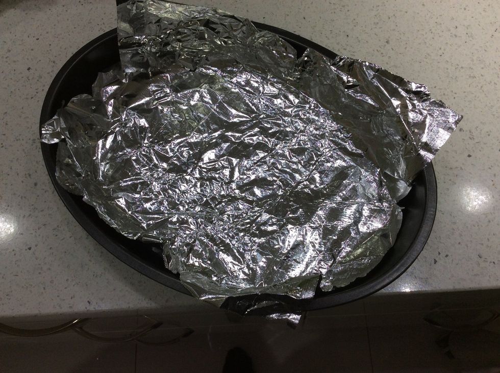 Step 2: Layout a baking tray with aluminium foil or non stick baking paper