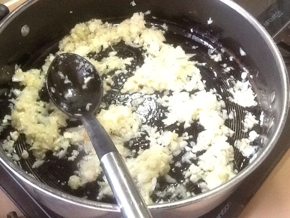 Step 2: Place the puree'd onion/garlic mix in your pan and softly cook.