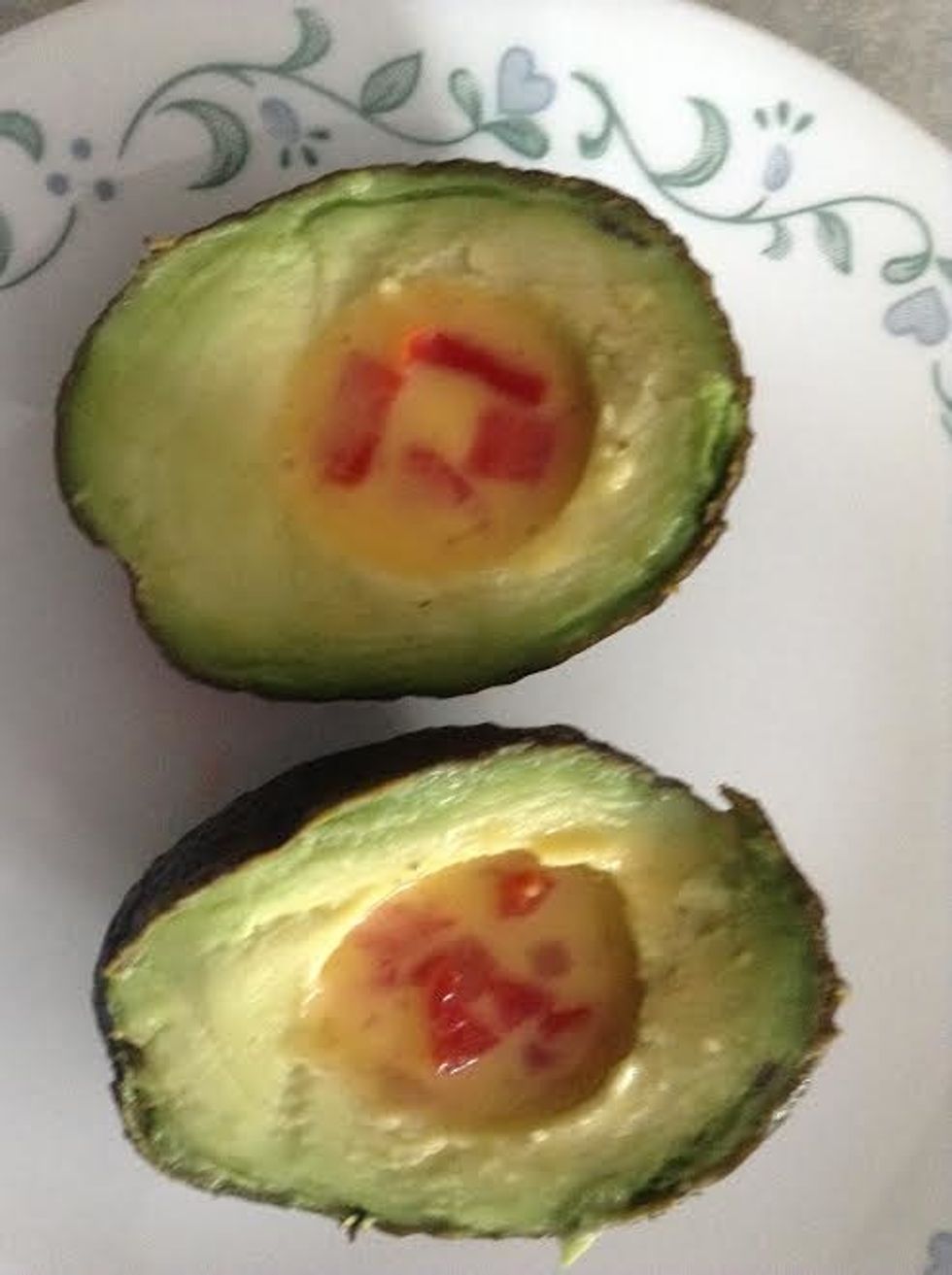 Step 2- Put red pepper into the Avocado.