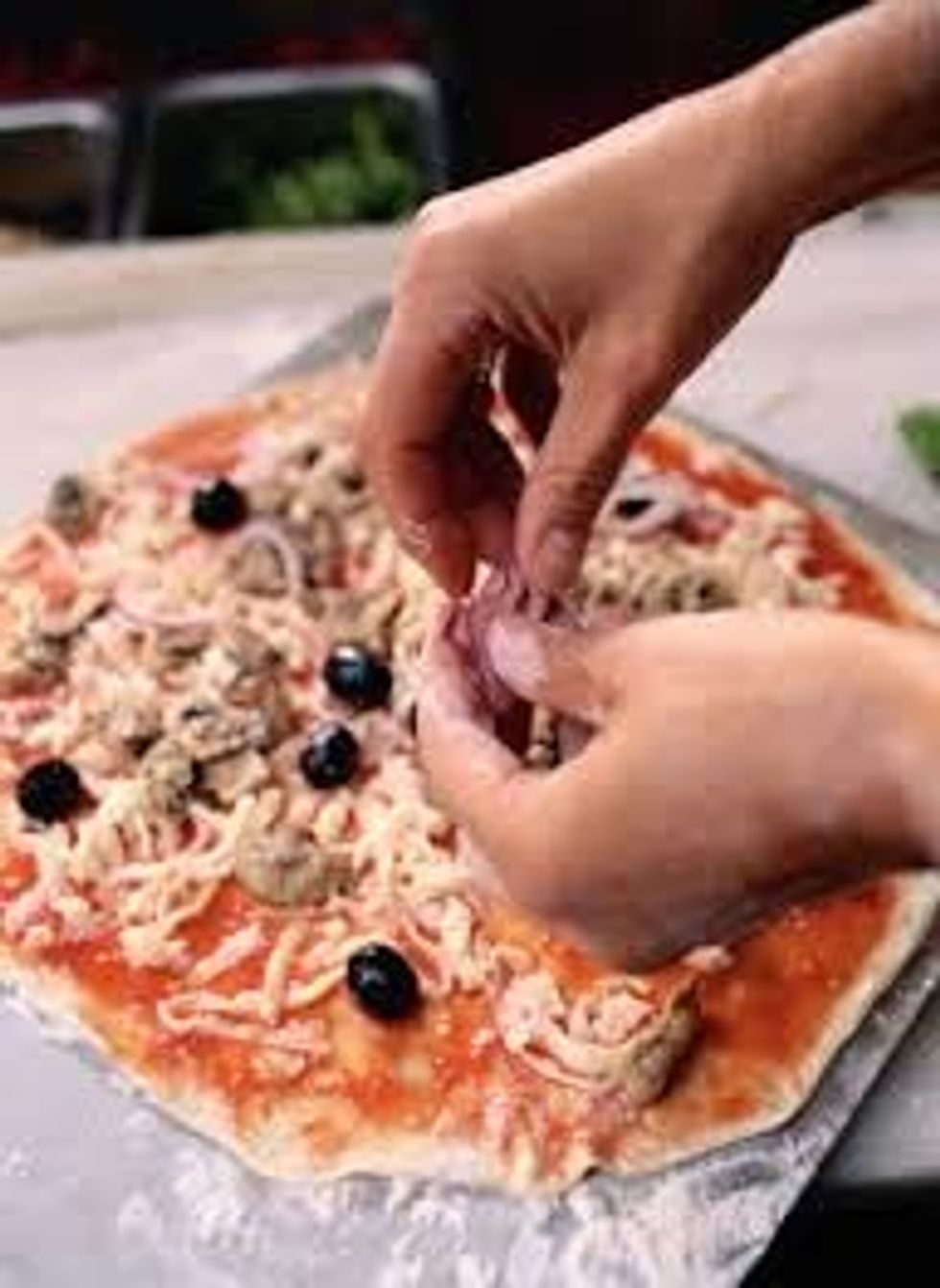 Step 2. Put the topping on that you want. For instance, there is pepperoni, cheese is good on a pizza.