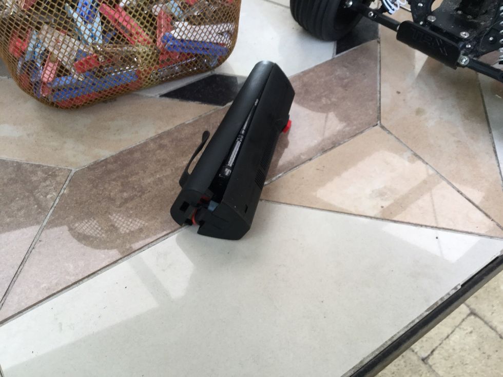 Step 2 take the battery of the charger and put it in its case,make sure its all clipped in so the battery does not fall out.