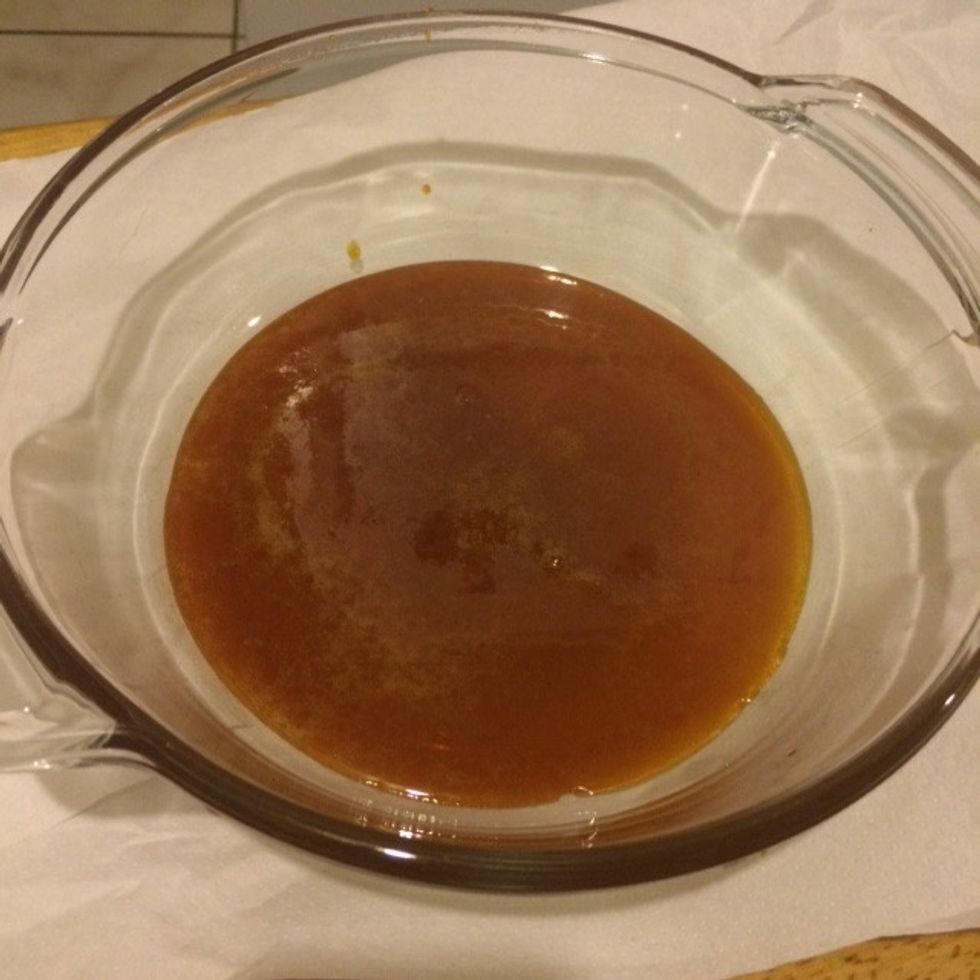 Step 2: Turn heat/stove off and pour the dissolved sugar into the round baking dish.