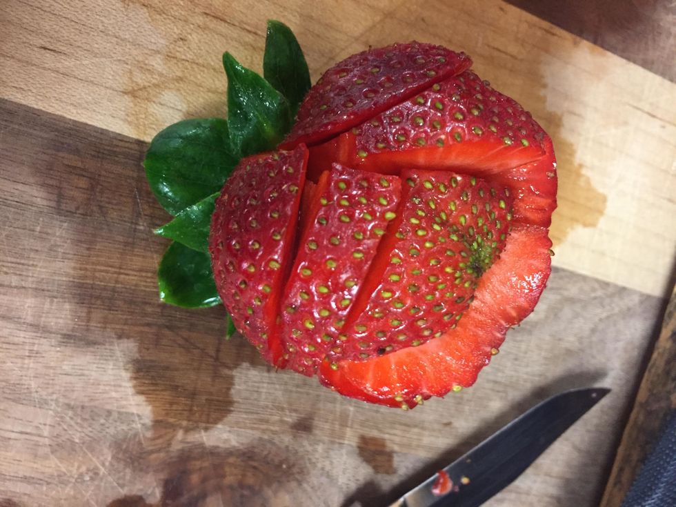 Step 2: You are going to Curl the tip of the layer to make a rose effect