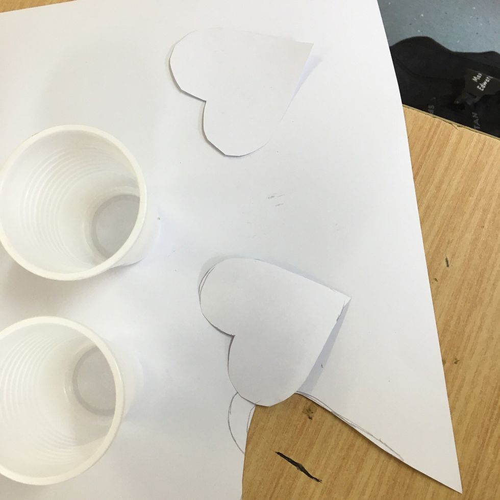 Step 2- You will then need to cut out two shapes of your choice. I chose hearts.