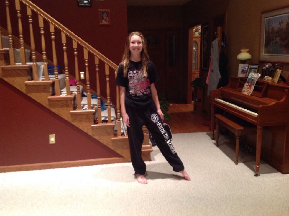 Step 26: You can also do the same with your legs the opposite way, left foot pointing forward, leg straight, right foot to the right, leg straight.