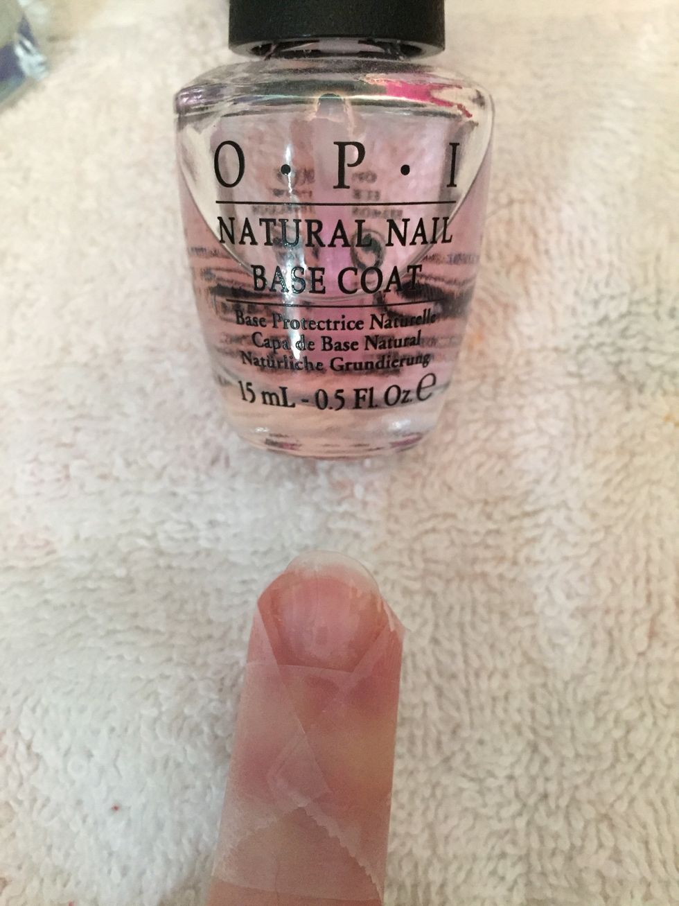 Step 3: Apply base coat of nail polish.