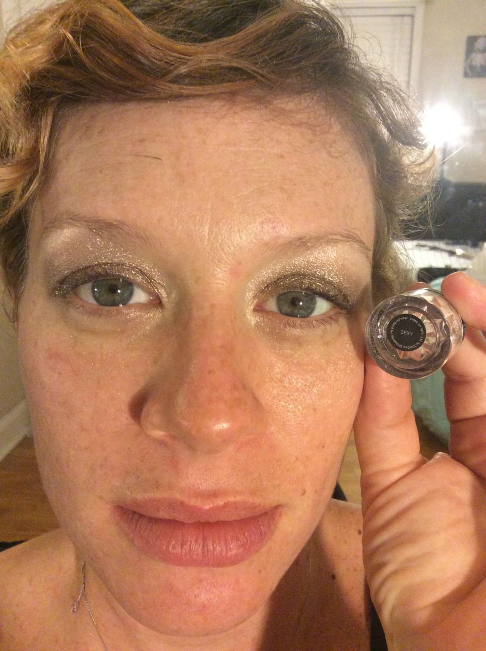 Step 3: Apply Younique's shimmer pigment mixed with Younique's Rose water all over to blend the previous 2 colors