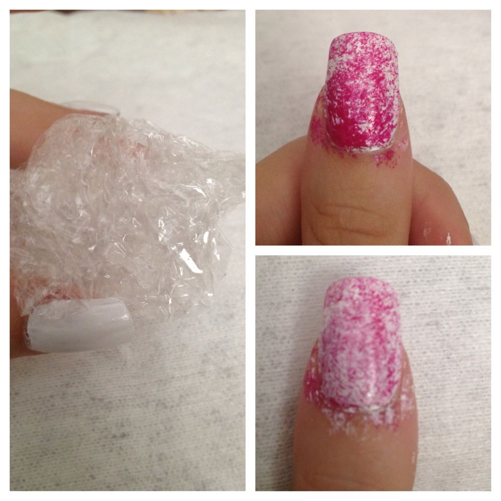 Step 3: Crinkle up clear plastic wrap. Dip into nail polish (darker color first) and dab continuously onto nail. Let this dry a little and then repeat step with lighter color.