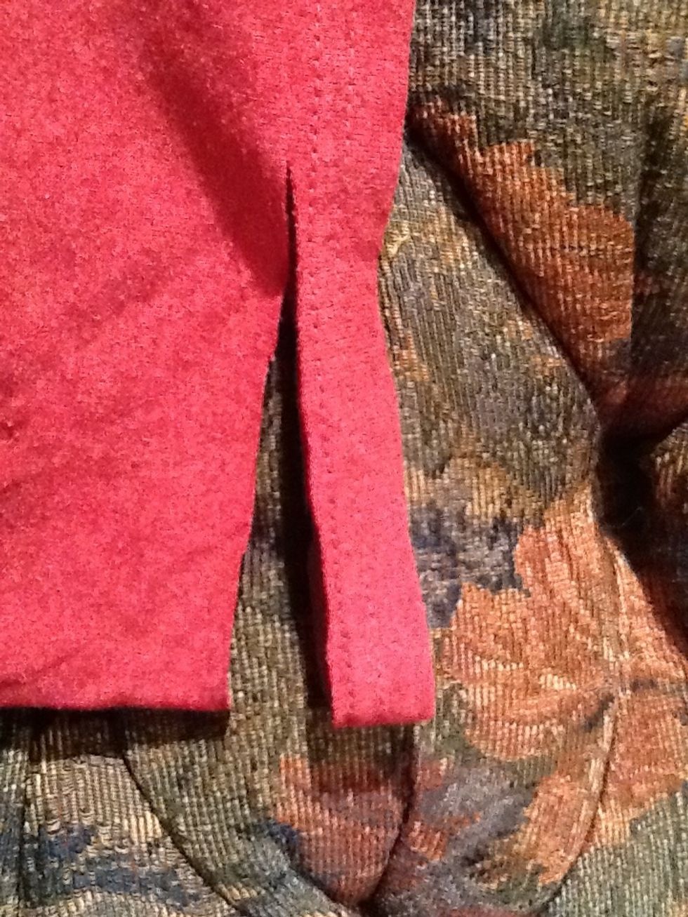 Step 3: Cut the bottom band of the t-shirt off. Again do not throw this away it could be used in another project.