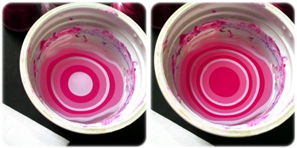 Step 3: Drip a drop of each color polish you've chosen. One on top of the other close to water surface. Make sure you do it quickly to prevent the polish drying on the surface of the water.