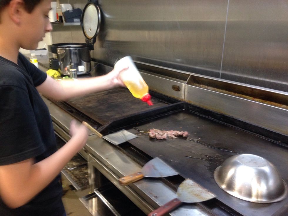 Step 3: Drizzle small amount of oil on top of the lamb, to help it grill.