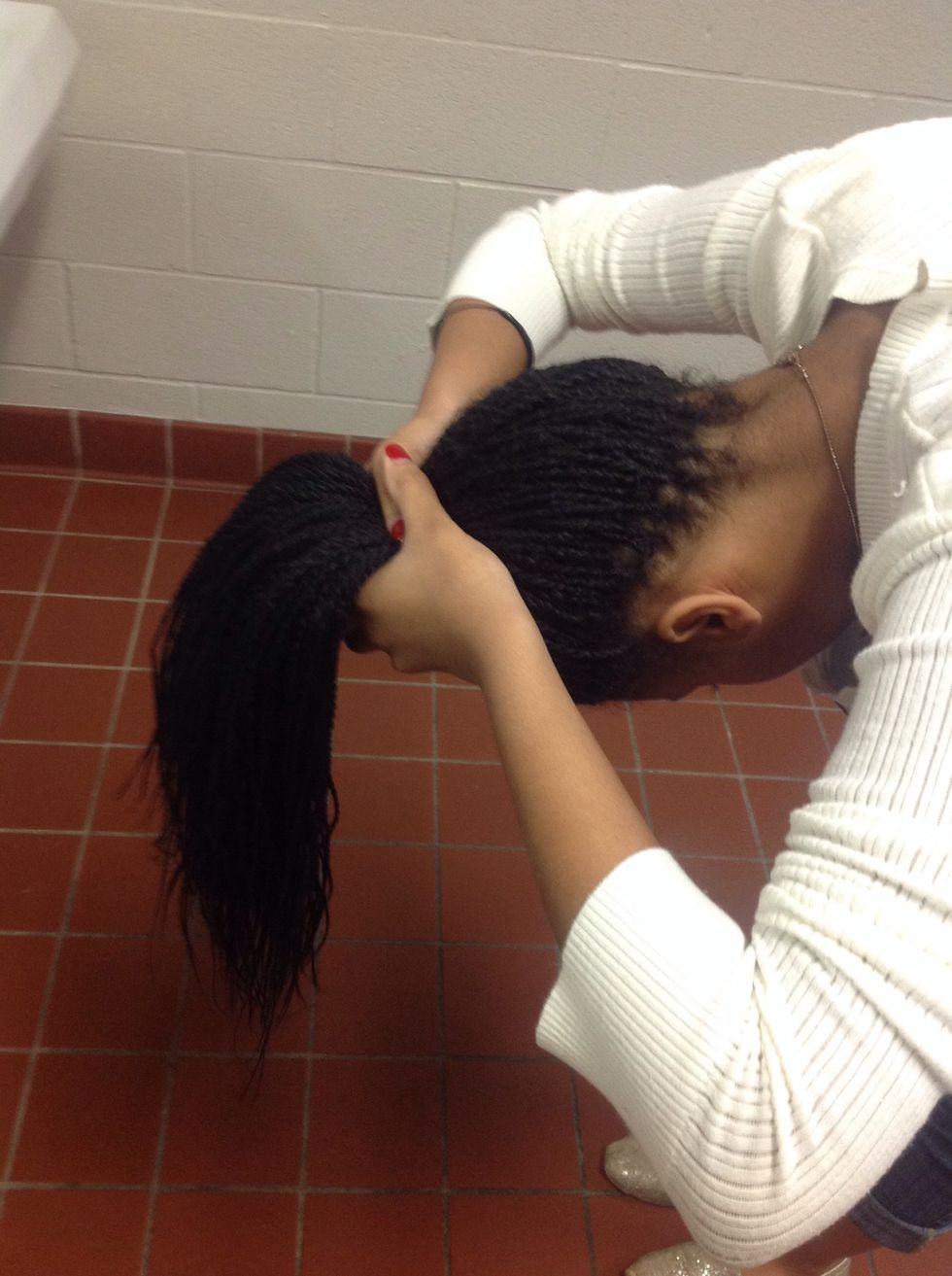 Step 3: Grip all of your hair into a high ponytail.