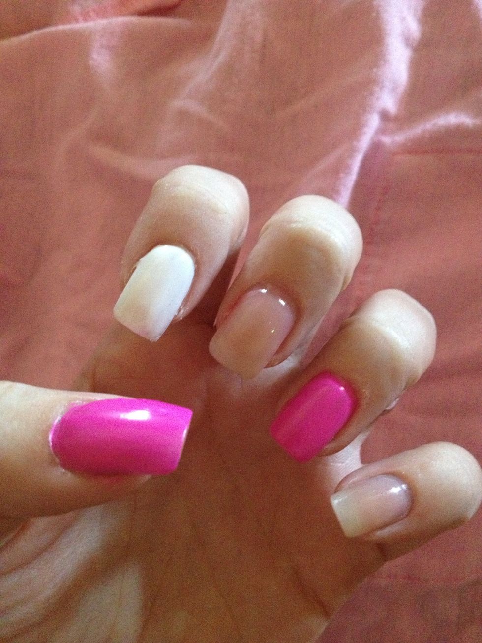 Step 3: Paint two coats of White nail polish on pointer finger, let dry.