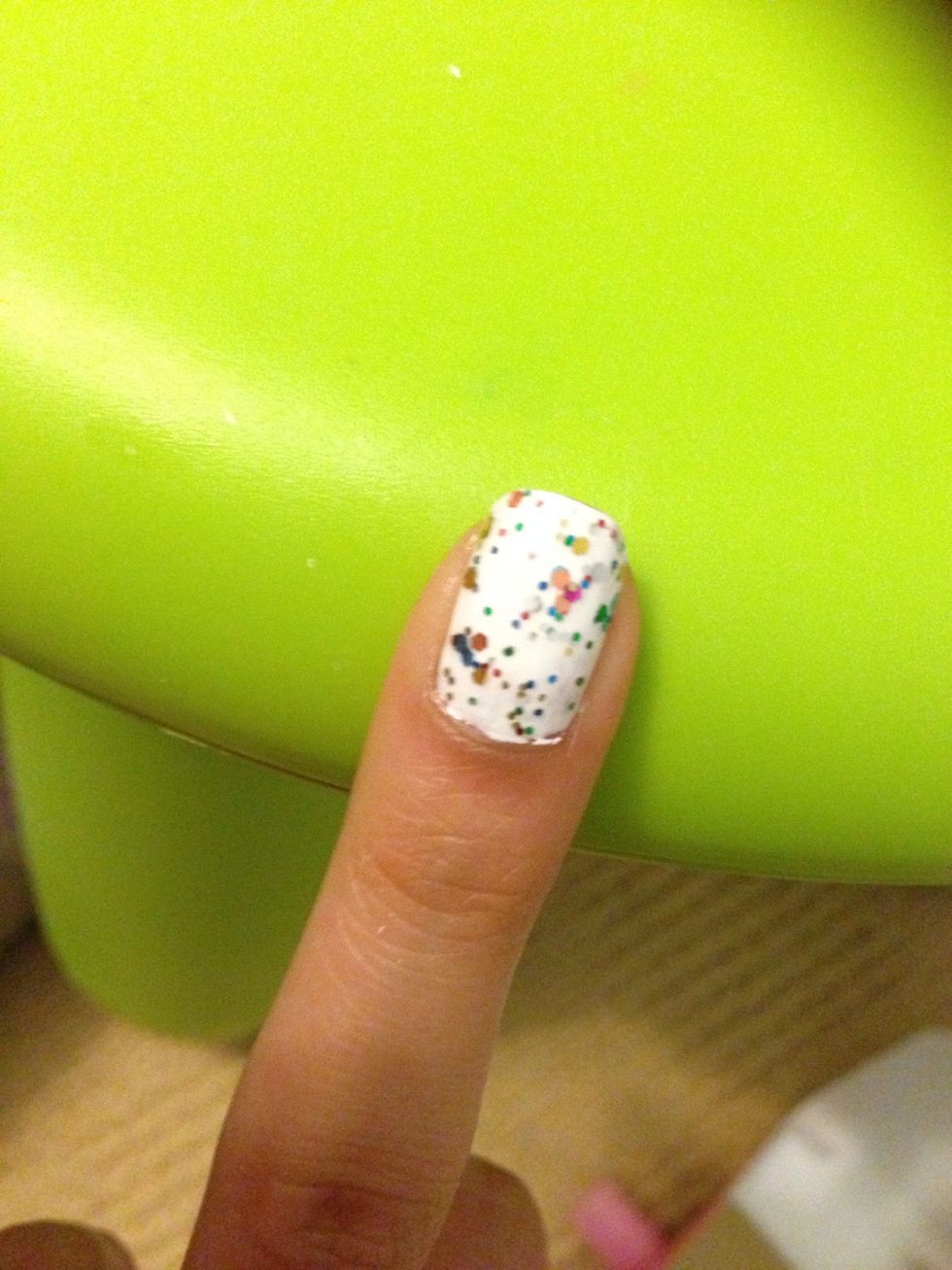 Step 3: Pick a finger and put on glitter nail polish ( optional)