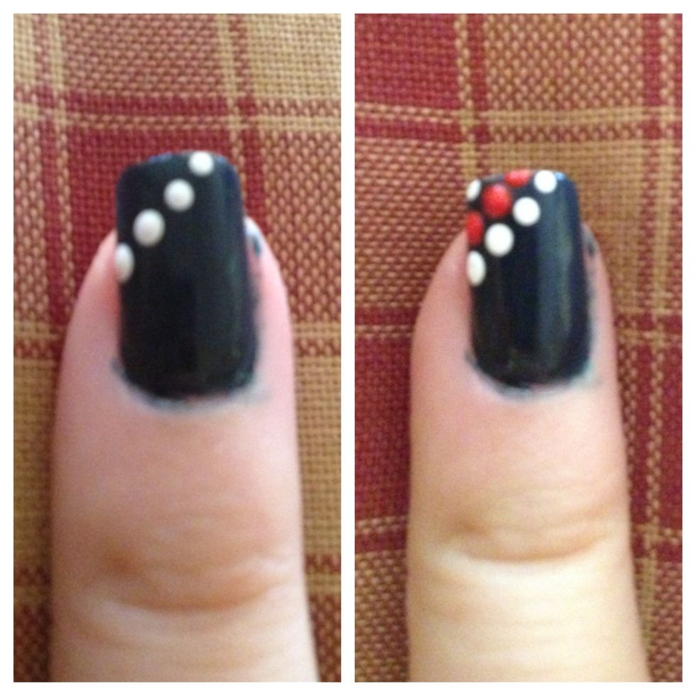 Step 3 (Pinky): Using dotting tool create diagonal dots on the upper corner of nail. I used the red nail polish and white acrylic paint to do this.