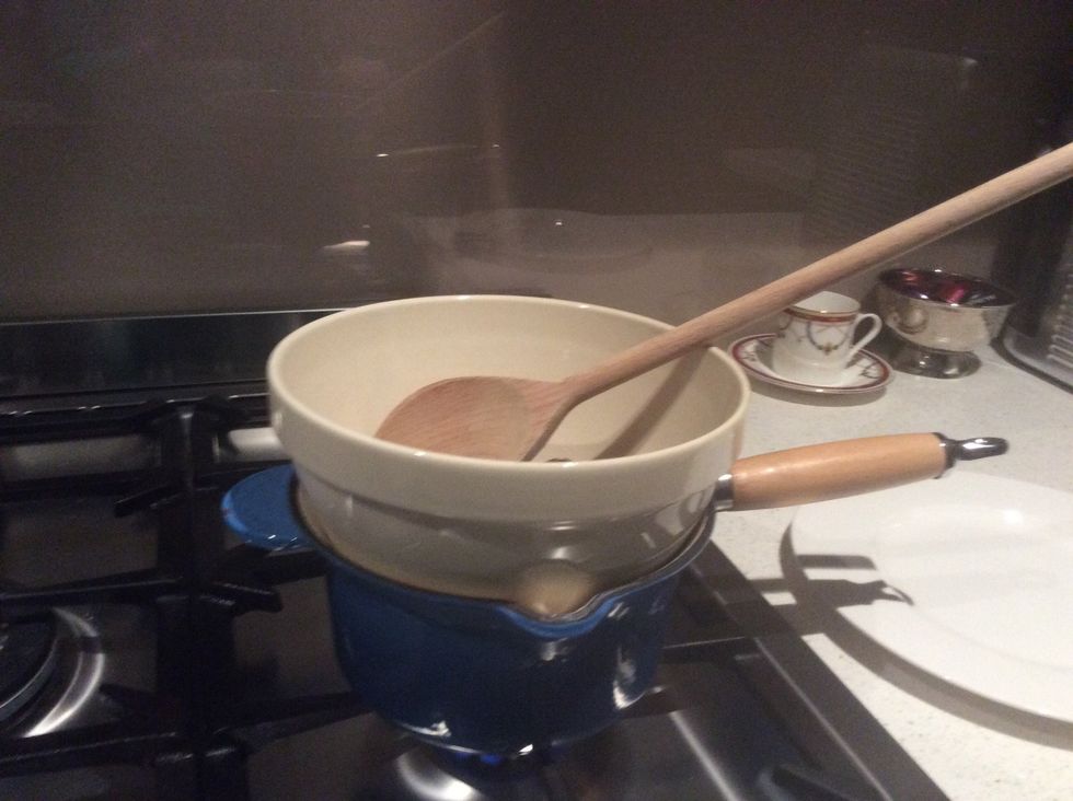 Step 3: place bowl of chocolate onto saucepan with hot water