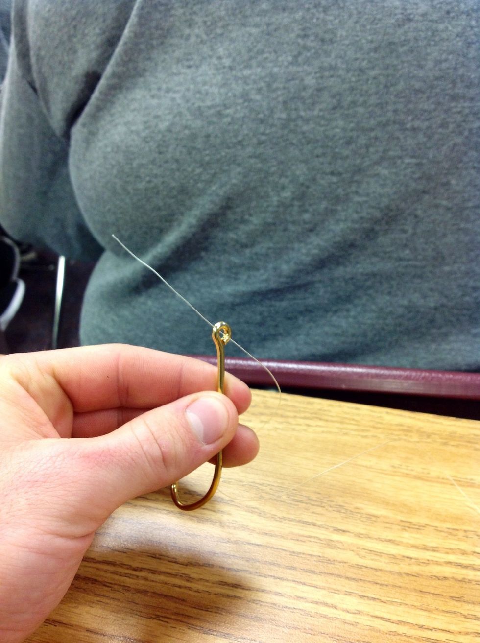 Step 3: Push the line through the eye of the hook