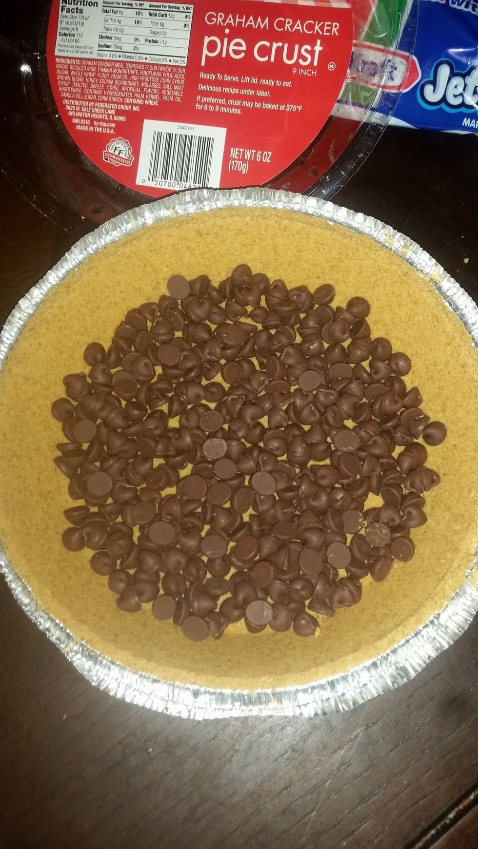 Step 3: Spread baking chips onto the pie crust.
