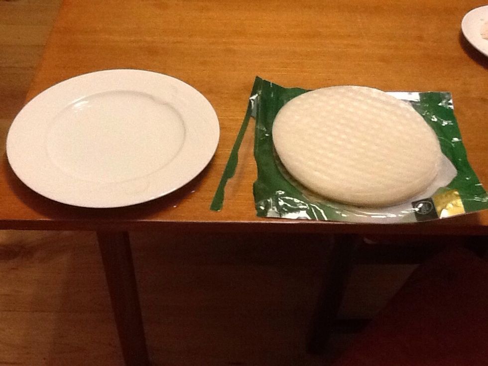 Step 3. To make your rice paper rolls your need to place a rice paper sheet in a slim layer of water on a plate. When you are done dipping the sheet in the water the sheet should be like jelly.