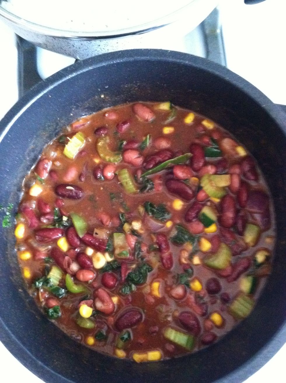 Step 4. Add the vegetables to The cooked beans and stir to Mix them evenly. Let it cook Together and add some pepperAnd salt (and cayenne pepper if Desirable)