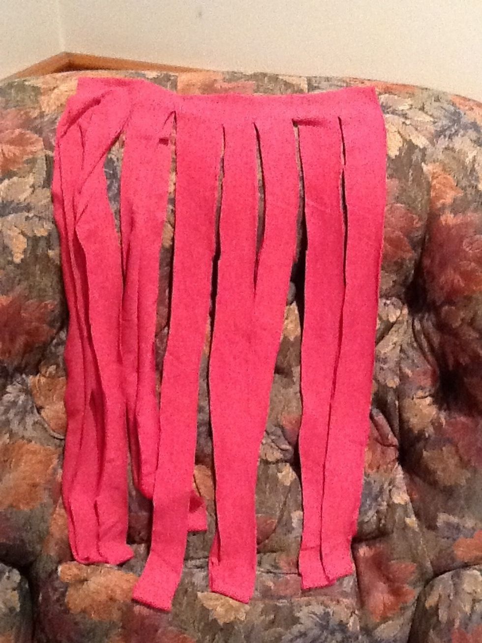 Step 4: Cut one inch strips up to about one inch from the top.