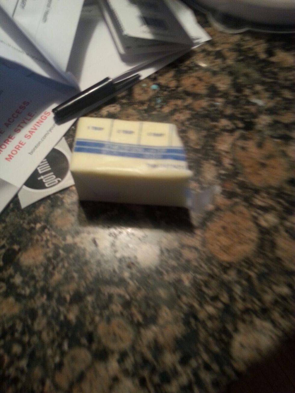 Step 4: divide two tablespoons of butter into 5 and put one piece in each corner and one in the center