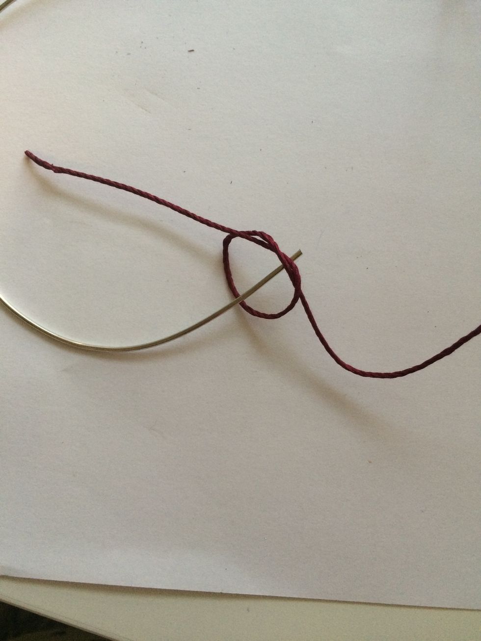 Step 4: Double knot one end of wire.