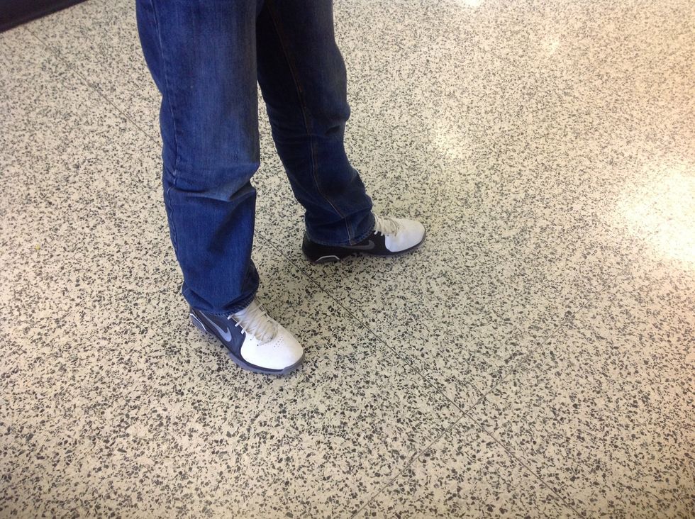 Step 4 If you are a righty put your left foot in front of your right foot about shoulder width apart.