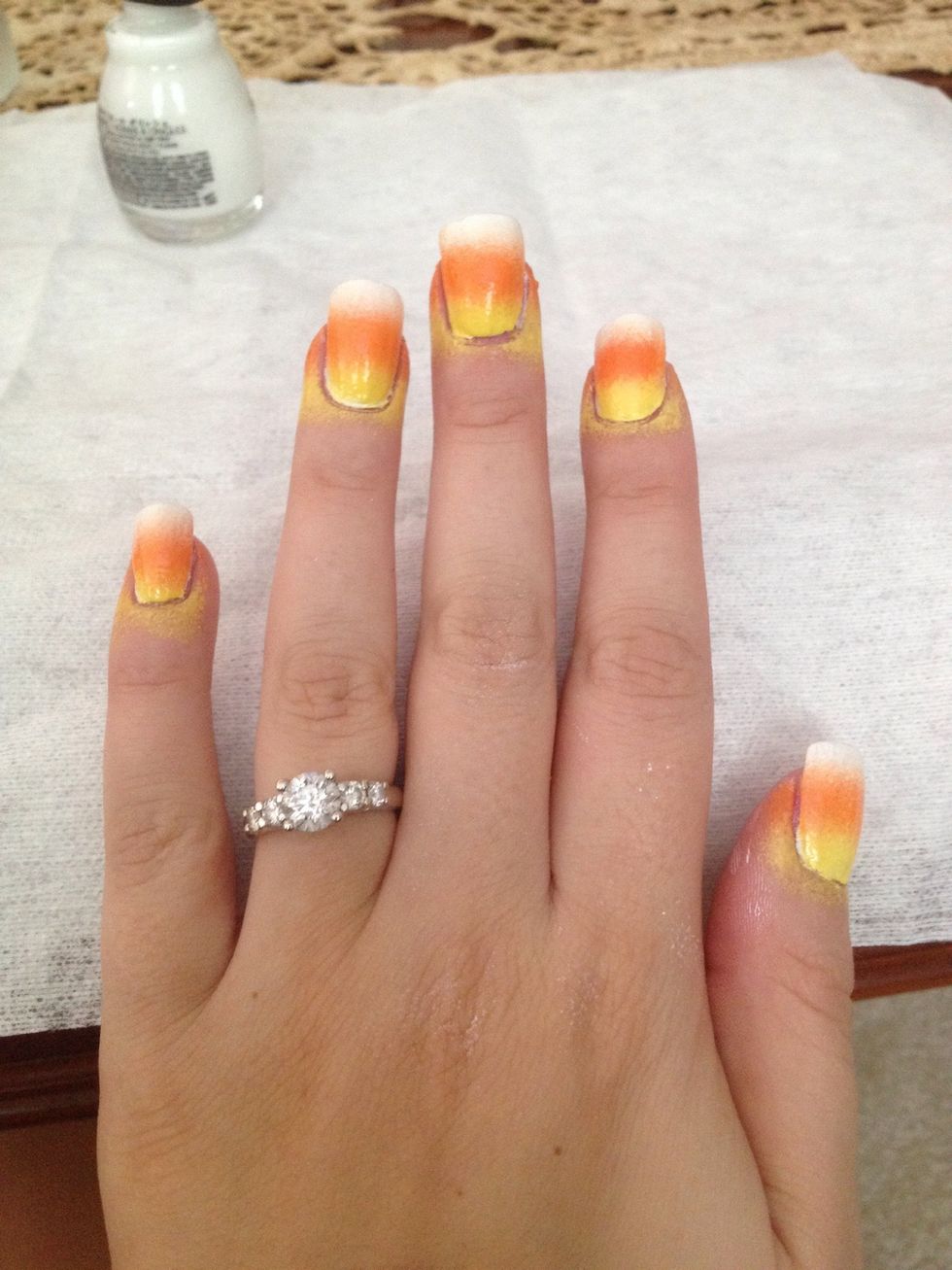 Step 4: Lightly sponge nails to get candy corn pattern and let dry completely