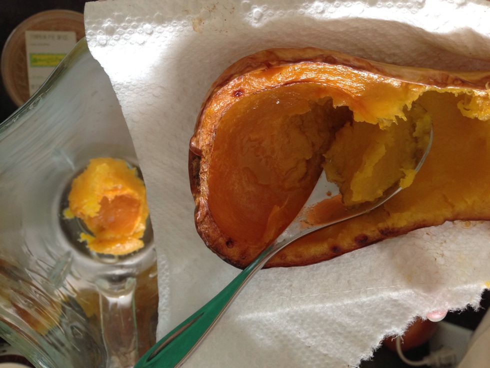 Step 4: Once the squash is cool enough to hold with a paper towel...scoop out the roasted squash into a blender. Discard the squash peel.