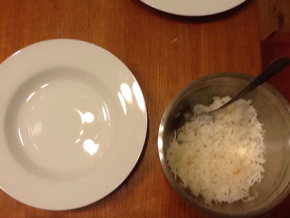 Step 4. Place the rice paper sheet down and add the rice noodles/rice to your rice paper.