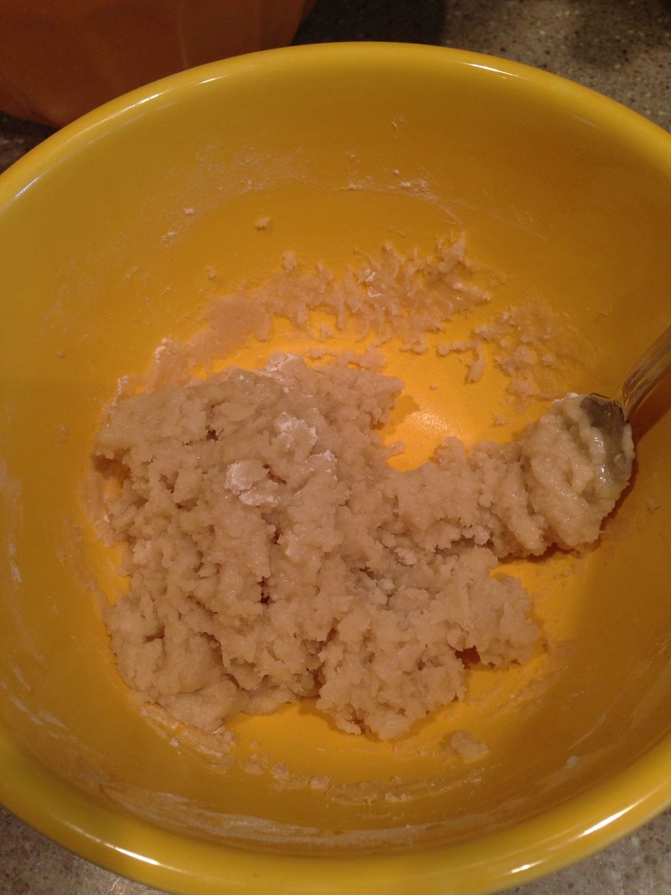Step 4: Using a fork gently mix the oil into the flour mixture without over mixing.