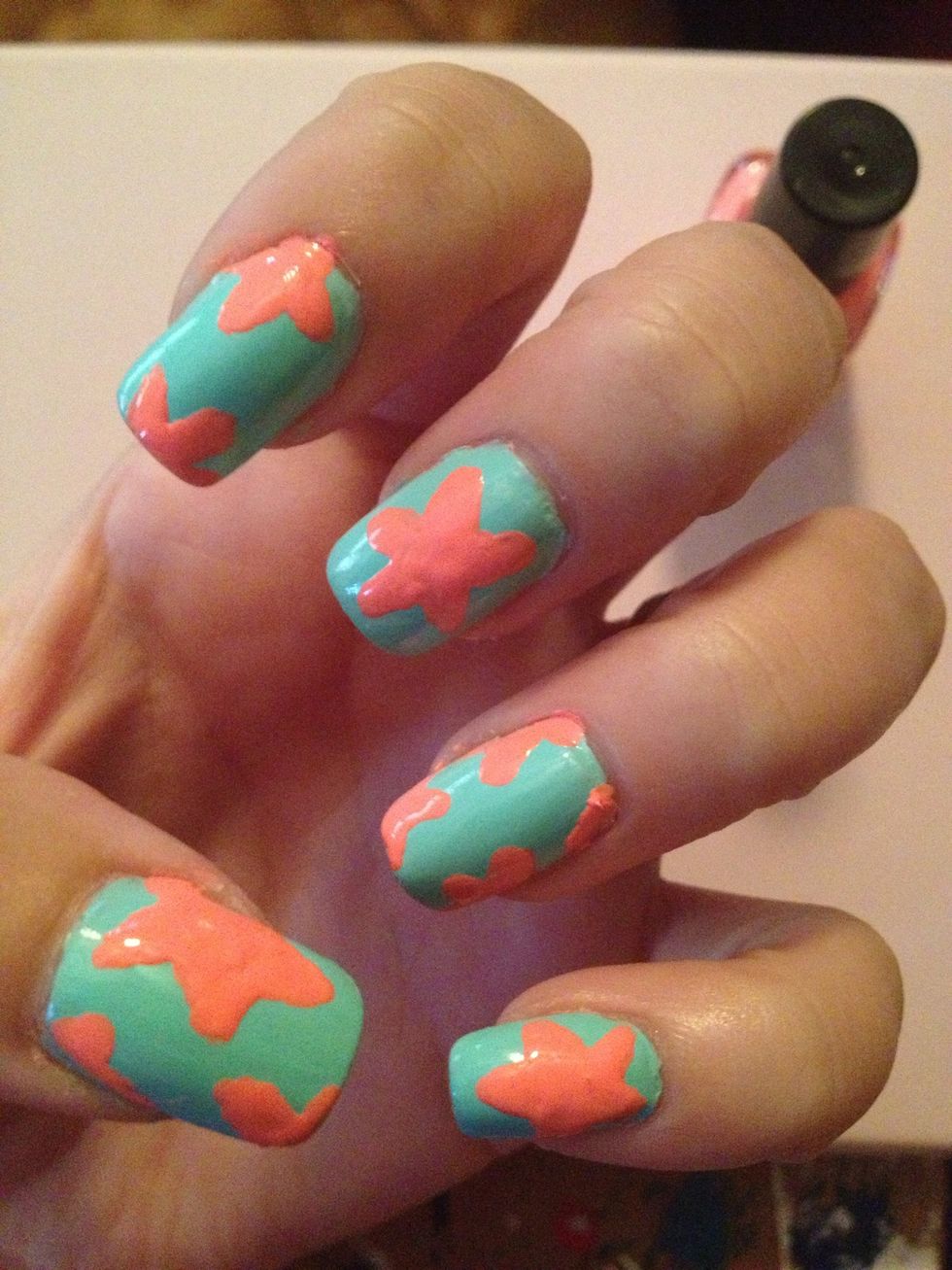 Step 4: You can repeat the pattern on all nails or do random placement of starfish as shown above.