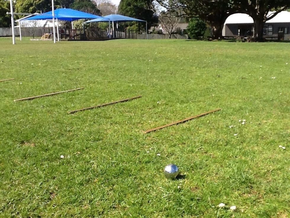 Step 4. : You have to throw past your year group line for 1 point. If you throw even further, you get 2  points.