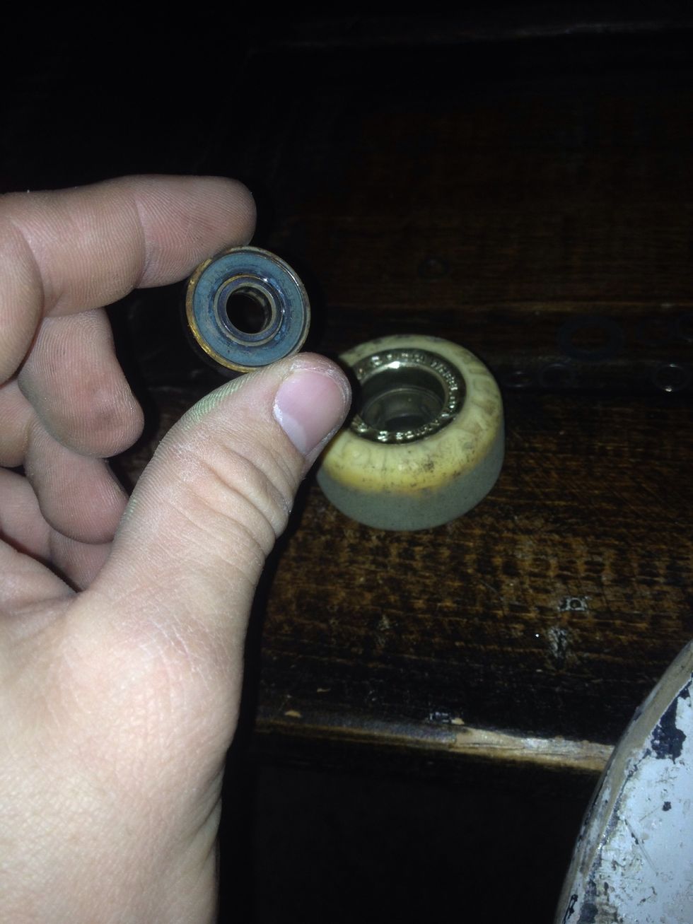 Step 4- You will need to place two bearings into the wheel, one on both sides of the wheel. This can be done by simply pushing down on the bearings with your hands or "bearing pusher"