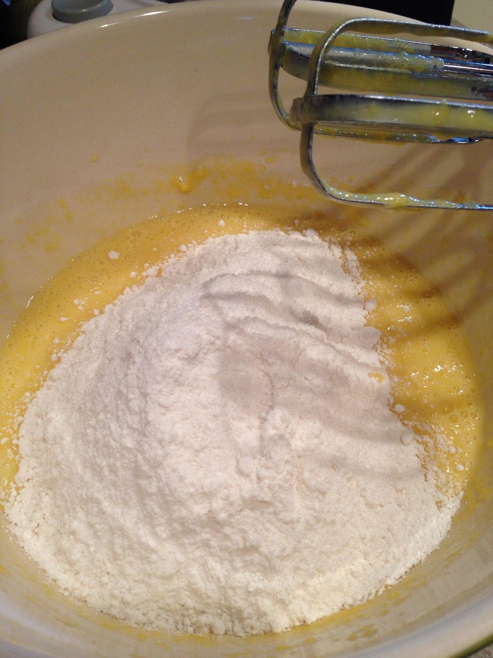 Step 5: add the small box of instant pudding mix and cake mix to milk, oil and egg mix.