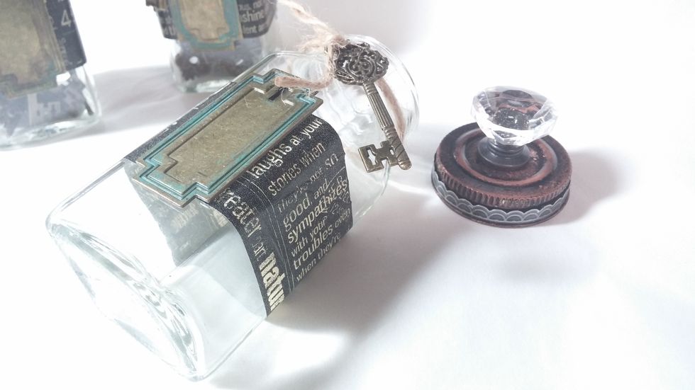 Step 5: Embellish Jar as desired. I used decorative tape and staples from Graphic 45.