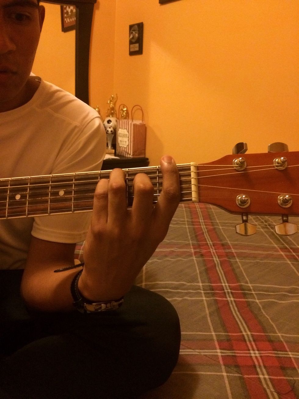 Step 5:place fingers in F position, bar cord on 1st fret, middle finger 2nd fret, G string, 3rd finger on 3rd fret, A string, 4 finger, 3rd fret, D string Picture:F chord (Fa)