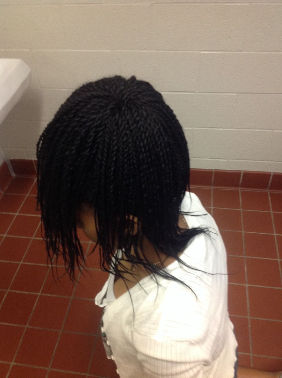 Step 5: Spread your Senegalese Twist evenly out, coming down around your head.