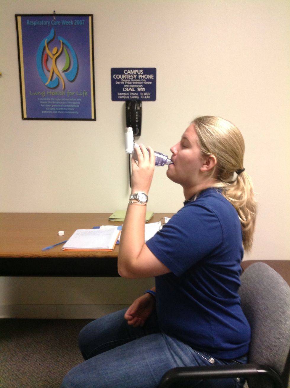 Step 5. This is the correct posture that the patient should be in. Sit up straight and tilt the head slightly back.