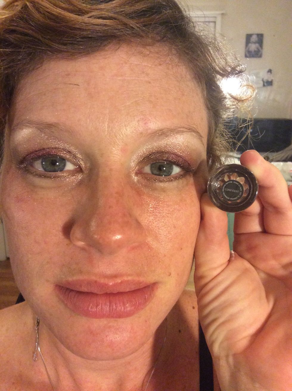Step 5: (Using Younique's eye liner brush) Apply Younique's shimmer pigment Confident mixed with Younique's Rose Water to the bottom lash line