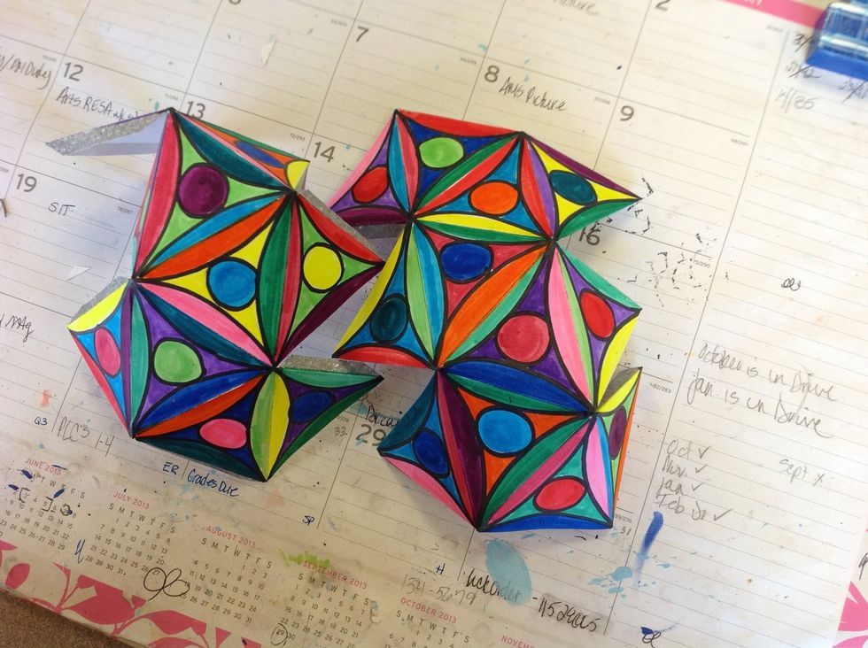 Step 6: Carefully fold along all of the lines and tabs. Make sure that you put sharp creases on your folds!