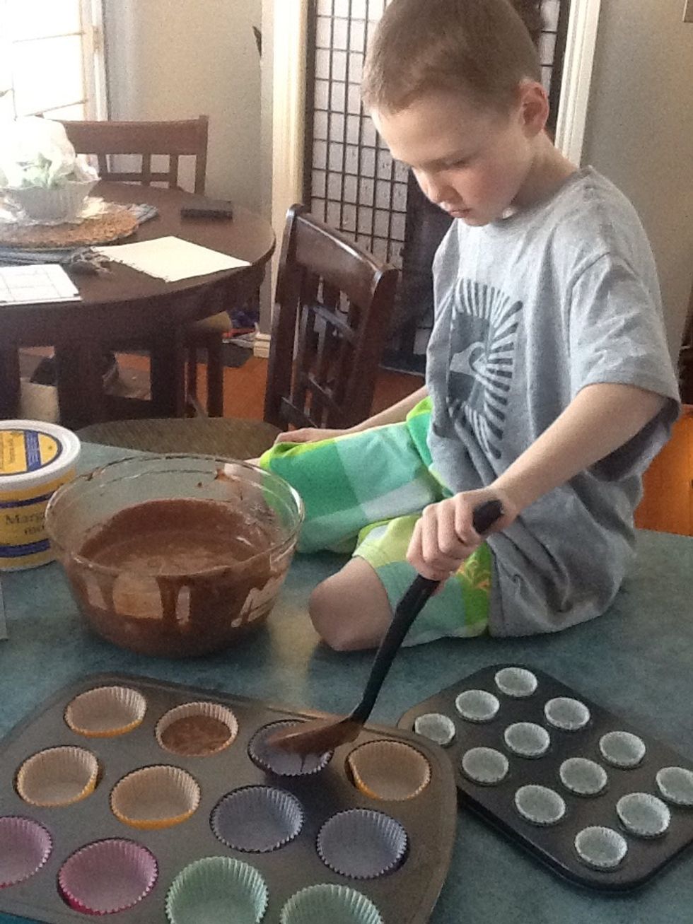 Step 6. Fill each cupcake liner half way with batter.