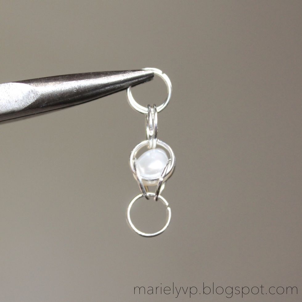 Step 6: keep adding jump rings and pearls the same way as step 2 and 4.